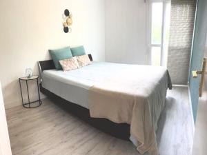 Postel nebo postele na pokoji v ubytování T3 cosy proche Bordeaux et Aéroport