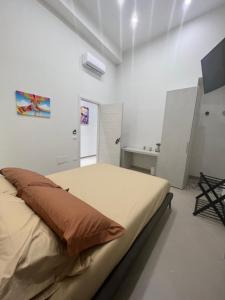 Cama o camas de una habitación en Dimora Chiaia 209