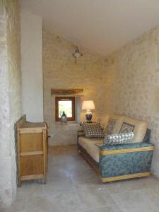 Posezení v ubytování L'Oratori : chambre La Gabarre