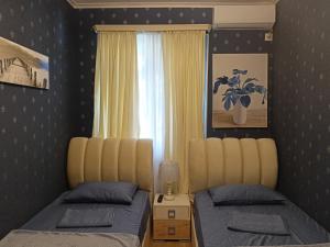 Postel nebo postele na pokoji v ubytování Hotel Lilo near Airport