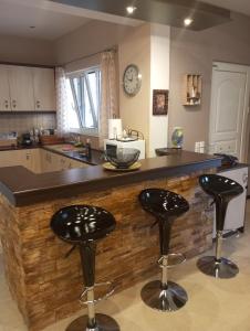 A kitchen or kitchenette at Villa Red Porto Cheli