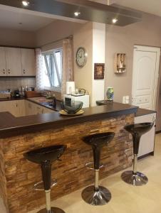 A kitchen or kitchenette at Villa Red Porto Cheli