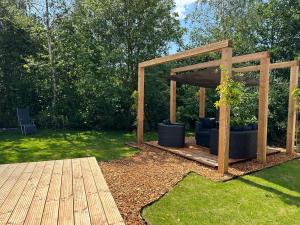 Afbeelding uit fotogalerij van Chalet de Blauwe regen in Balkbrug