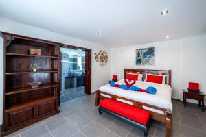 Postel nebo postele na pokoji v ubytování Siam Royal View Villas
