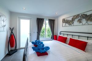 Postel nebo postele na pokoji v ubytování Siam Royal View Villas