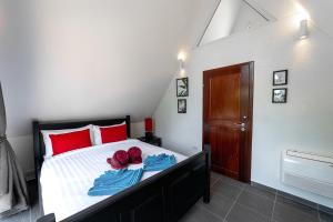 Postel nebo postele na pokoji v ubytování Siam Royal View Villas
