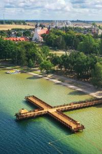 an aerial view of a dock in the water at Kaszuby Dom W Wielu in Wiele