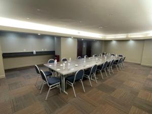 a large conference room with a long table and chairs at Holiday Inn Express Cleveland Downtown, an IHG Hotel in Cleveland