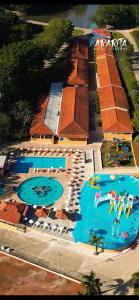 an overhead view of a resort with several pools at Hotel Fazenda Ararita in Pôrto Feliz