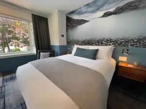 Postel nebo postele na pokoji v ubytování Artisan Suites on Bowen