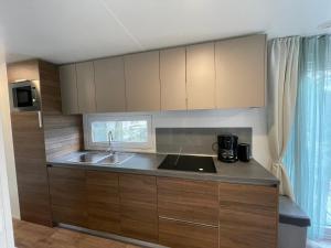 Kuchyň nebo kuchyňský kout v ubytování Chalet Het Edelhert