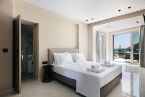Postel nebo postele na pokoji v ubytování Isla Villas & Suites + 37 fotografií