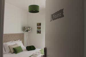 Letto o letti in una camera di ArouceHostel