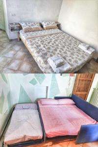 sypialnia z 2 łóżkami w pokoju w obiekcie Maremma Toscana House w mieście Prata