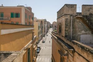 a view of a street from a building at Suite Sabean by STHEY in Monopoli