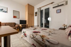 Ένα ή περισσότερα κρεβάτια σε δωμάτιο στο Central Cozy Apartment 4