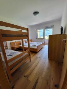 Posteľ alebo postele v izbe v ubytovaní Apartment Mölltaler Gletscher 6