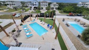 an aerial view of a pool at a resort at ShortWalk2 in Oak Island
