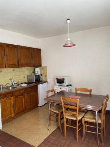 Kuchyň nebo kuchyňský kout v ubytování Motel - Location studio 2 personnes
