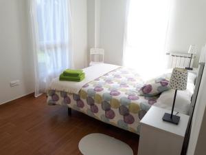 Postel nebo postele na pokoji v ubytování Apartamentos Somo1