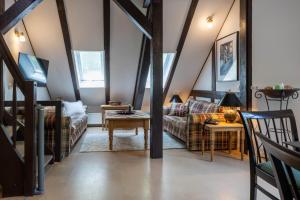 Posedenie v ubytovaní Strandvilla Hubertus Boltenhagen - Ferienwohnungen Apartment mit Parkplatz WLAN Küche Garten Grillplatz Waldbaden