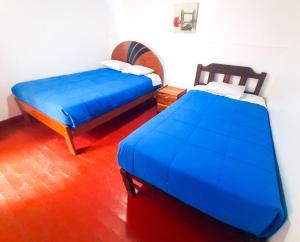 Ліжко або ліжка в номері Peru Hostel Inn Plaza