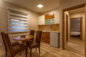 Kuchyň nebo kuchyňský kout v ubytování Apartment Vila Simovic + 16 fotografií