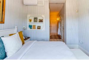 Postel nebo postele na pokoji v ubytování The Pearl - Marbella