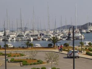 a marina with lots of boats in the water at Apartment Grubelić in Tribunj