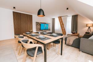 TV a/nebo společenská místnost v ubytování Apartmán 25 Karlova Studánka