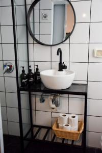Koupelna v ubytování LEVO Urban Studios