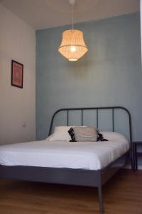 Postel nebo postele na pokoji v ubytování LEVO Urban Studios