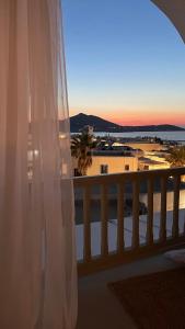 a view of the ocean from a balcony at Anthoula Home Paros in Naousa