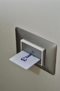 a piece of paper is attached to a paper dispenser at Home 13 in San Gregorio di Catania