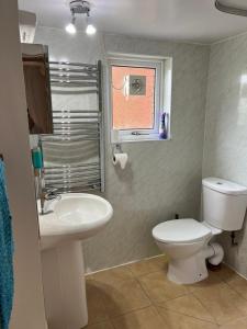 Koupelna v ubytování Raraig House Garden Apartment