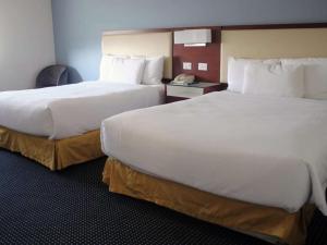 Postel nebo postele na pokoji v ubytování Best Western Santorin