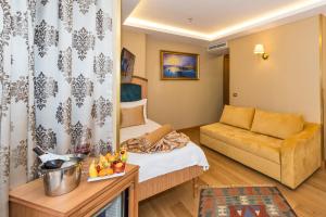 A seating area at Aprilis Gold Hotel - Special Category