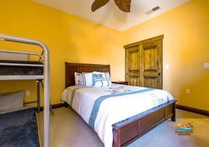 a bedroom with a bed and a bunk bed at Upscale San Felipe Vacation Villa 41-1 in Playa El Paraíso