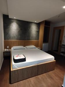 Säng eller sängar i ett rum på Hotel Estrela da Agua Fria