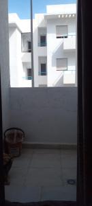 a view of a building from a window at Al Hoceima Badess in Al Hoceïma