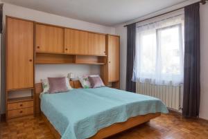 Postel nebo postele na pokoji v ubytování Apartments with a parking space Biograd na Moru, Biograd - 863