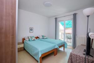 Postel nebo postele na pokoji v ubytování Apartments with a parking space Biograd na Moru, Biograd - 863