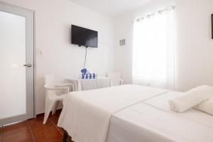 Krevet ili kreveti u jedinici u okviru objekta R&V Combate Beach House 1 with Pool