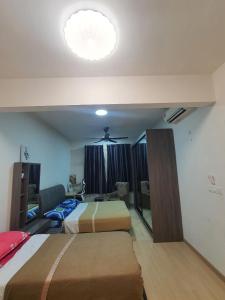 Postel nebo postele na pokoji v ubytování Family Condo Gravit 8 , Ashino