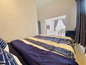 Letto o letti in una camera di villa view2 sayriah