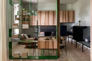 a living room with a table in a room at Drift House in Port Fairy