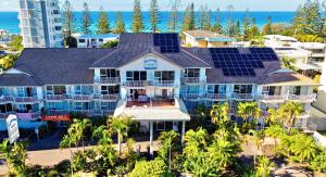 an aerial view of a house with solar panels on it at Charming Burleigh Studio in Gold Coast