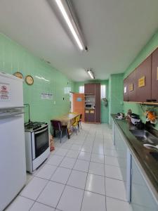 Kuchyň nebo kuchyňský kout v ubytování Nomads Hostel Multicultural & Coworking