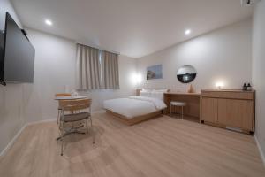 Aank Hotel Ilsan客房内的一张或多张床位