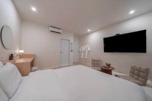 Aank Hotel Ilsan客房内的一张或多张床位